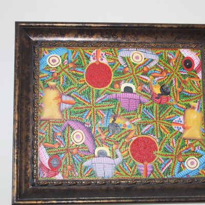 Vibrant folk art painting depicting figures harvesting in a field, housed in a thick, dark burnished metallic frame.