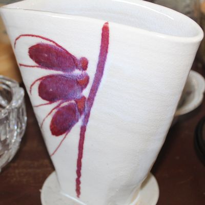 Contemporary studio pottery ceramic vase featuring a white matte finish with abstract maroon and purple painted floral detailing.