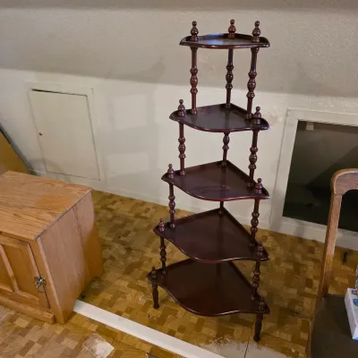 Sale Photo Thumbnail #12: Vintage five-tier mahogany corner what-not shelf with turned spindle supports and finials.