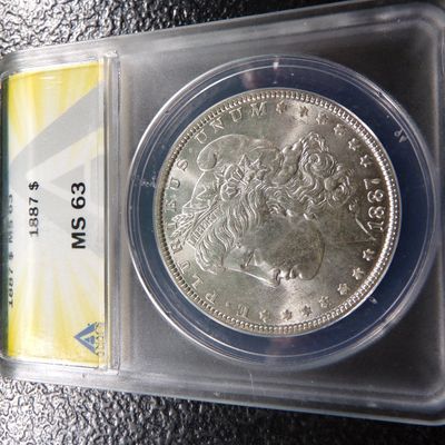 1887 ANACS MS63 MORGAN SILVER DOLLAR