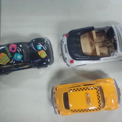 Three Pull-Back Volkswagen Beetle Toy Cars
