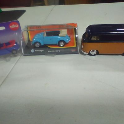 Three Collectible Volkswagen Model Vehicles including Siku and New-Ray