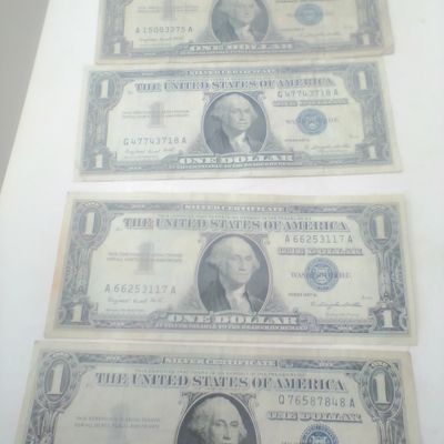 A Collection of US One Dollar Silver Certificates Series 1957 A
