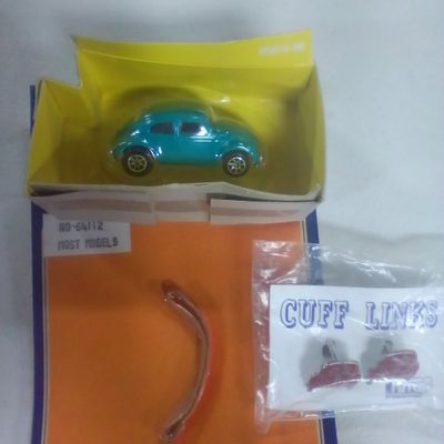 Collection of Volkswagen Beetle Themed Die-Cast Model and Accessories