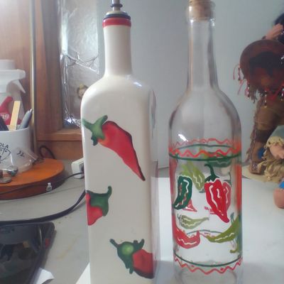 Two Decorative Chili Pepper Themed Kitchen Bottles