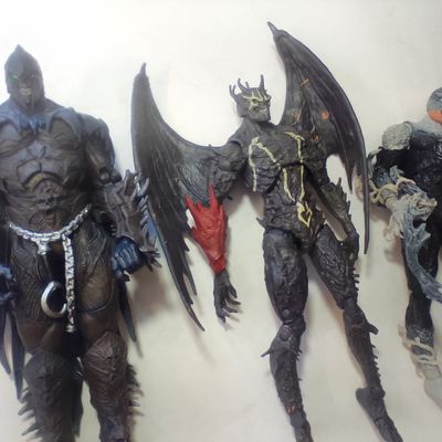 Three McFarlane Toys Spawn Universe 7 Inch Articulated Action Figures A Pair of TMP Intl. LLC Articulated Plastic Spawn Action Figures