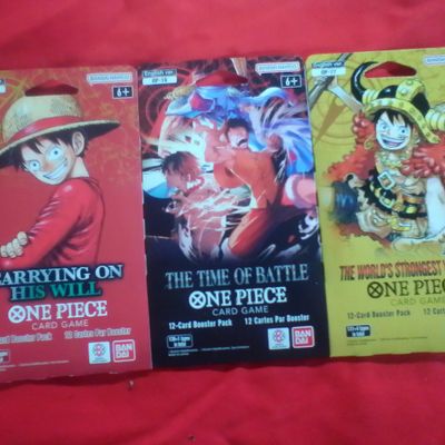 Three Unopened One Piece Card Game Booster Packs