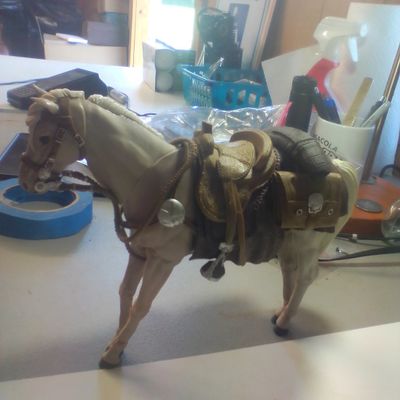 Articulated Model Horse with Western Style Tack and Skull Emblem Saddlebags