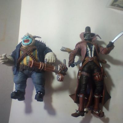 A Pair of TMP Intl. LLC Articulated. Two Spawn Action Figures and a Heavy Weapon Robotic Accessory McFarlane Toys