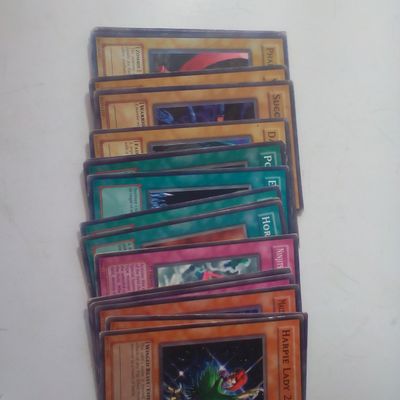 A Collection of Approximately 15 to 20 Yu-Gi-Oh! Trading Cards Including Harpie Lady 2 RDS-EN018