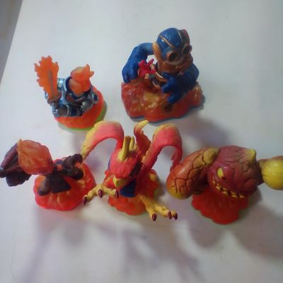A Collection of Five Skylanders Fire Element Video Game Figurines