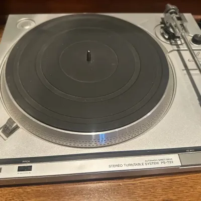 Vintage Sony PS-T22 automatic direct-drive stereo turntable in a silver-finish chassis, circa late 1970s to early 1980s.