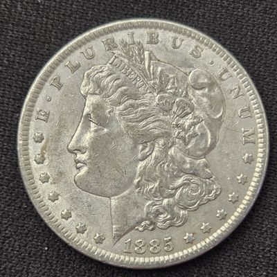 AU - 1885 Morgan 90% Silver Dollar