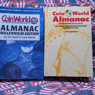 Two Coin World Almanacs, Millennium Edition and the Fifth Edition signed by the staff Contributors