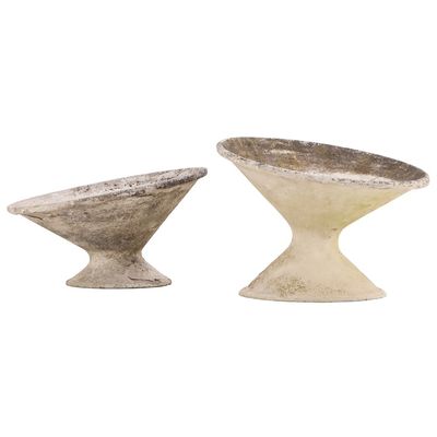 TWO FRENCH CAST STONE CANTED DISC PLANTERS DESIGNED BY WILLY GUHL C 1970