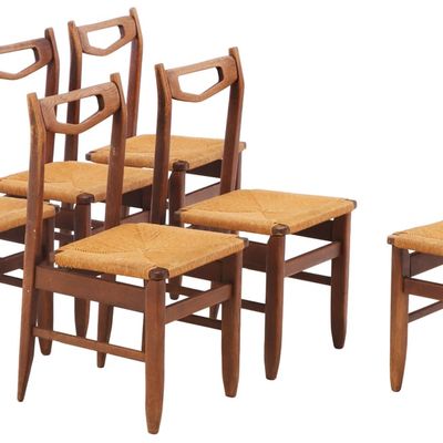 SIX FRENCH OAK AND RUSH DINING CHAIRS BY GUILLERME AND CHAMBRON C 1960.