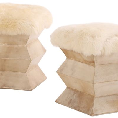 PAIR PARCHMENT AND FAUX GOAT HAIR COVERED STOOLS.