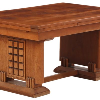 FRENCH OAK DINING TABLE WITH TWO LEAVES HAVING GEOMETRIC MOTIFS IN THE MANNER OF CHARLES DUDOUYT