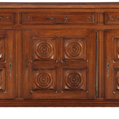 FRENCH OAK SIDEBOARD WITH CIRCULAR DESIGN IN THE MANNER OF CHARLES DUDOUYT C 1940.