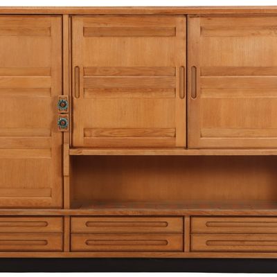 FRENCH OAK CABINET BY CHAMBRON AND GUILLERME C 1960 HAVING TWO SLIDING DOORS AND A SINGLE DOOR