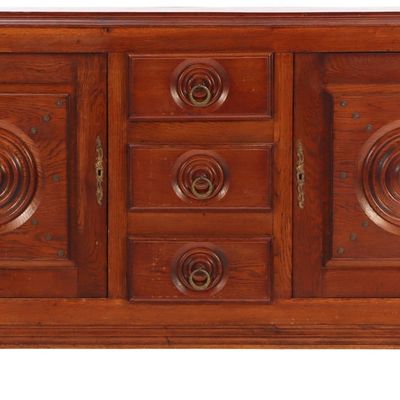 FRENCH TWO DOOR OAK SIDEBAORD IN THE MANNER OF DUDOUYT HAVING CIRCULAR AND METAL STUD DECORATION