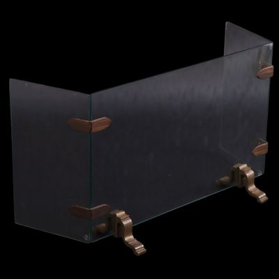 THREE PANEL BRASS AND GLASS FIRE SCREEN C 1950.