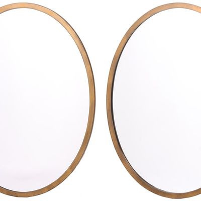 PAIR OF OVAL BRASS MIRRORS C 1940.