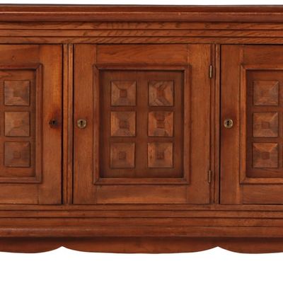 FRENCH OAK THREE DOOR SIDEBOARD WITH GEOMETRIC MOTIFS IN THE MANNER OF DUDOUYT C 1940.