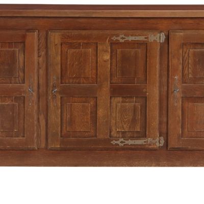 ONE OF TWO FRENCH BRUTALIST STYLE THREE DOOR OAK SIDEBOARDS WITH GEOMETRIC MOTIFS AND IRON STRAP