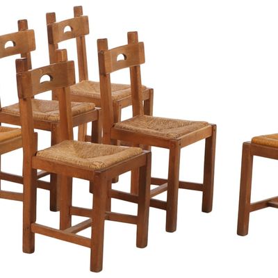 SIX FRENCH SOLID OAK AND RUSH BRUTALIST STYLE DINING CHAIRS WITH PEGGED CONSTRUCTION C 1960.