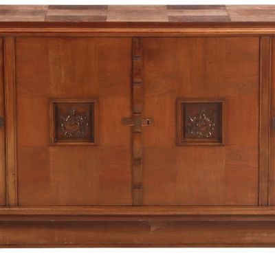 FRENCH MAHOGANY SIDEBOARD HAVING GEOMETRIC MOTIFS AND RESTING ON ROUND FEET C 1945.
