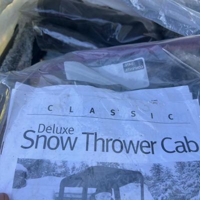 Sale Photo Thumbnail #119: Classic Accessories Deluxe Snow Thrower Cab with original manual and parts in plastic packaging.