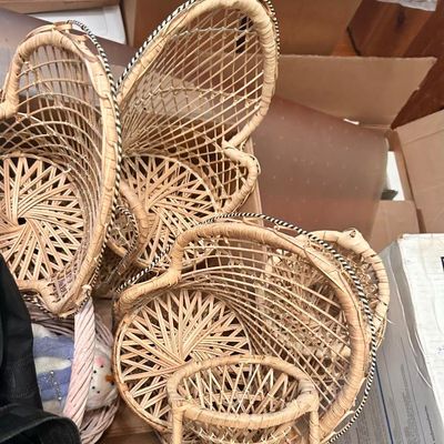 Sale Photo Thumbnail #75: Collection of vintage miniature wicker peacock chairs.