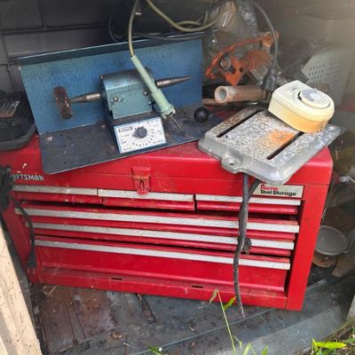 Sale Photo Thumbnail #94: Red Craftsman tool chest with multiple drawers, topped with a vintage blue bench grinder and other assorted tools.