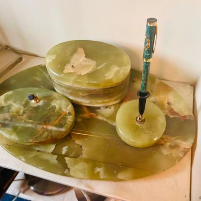 Sale Photo Thumbnail #8: Vintage green onyx desk set, including a matching tray, lidded boxes, and an inkwell with a coordinating pen.
