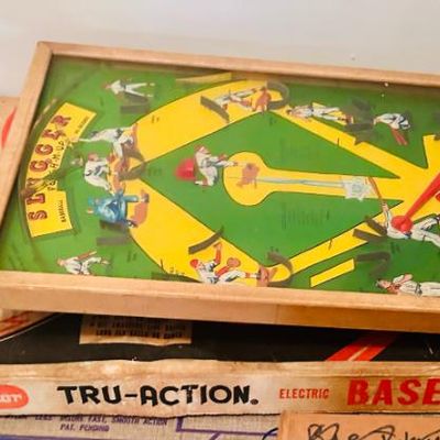Sale Photo Thumbnail #20: Vintage Tudor Tru-Action Electric Baseball Game with its original box and illustrated game board.