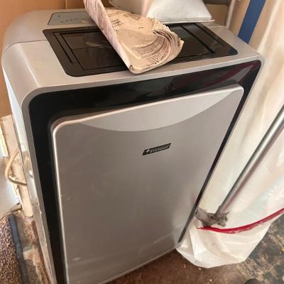 Sale Photo Thumbnail #100: Everstar portable air conditioner unit with exhaust hose attachment.
