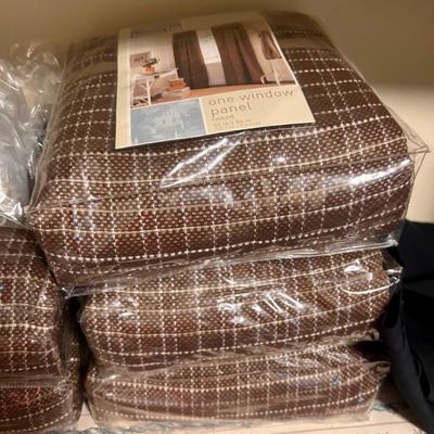 Sale Photo Thumbnail #73: Packaged brown tweed window panels measuring 54 inches by 84 inches.