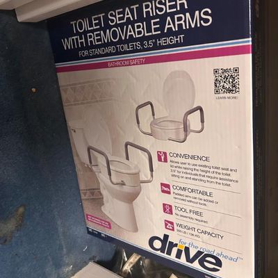 Sale Photo Thumbnail #89: Drive Medical toilet seat riser with removable arms, designed for standard toilets with a 3.5-inch height.