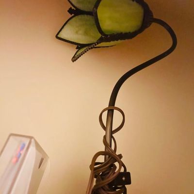 Sale Photo Thumbnail #6: Vintage gooseneck desk lamp featuring a green slag glass tulip-style shade.