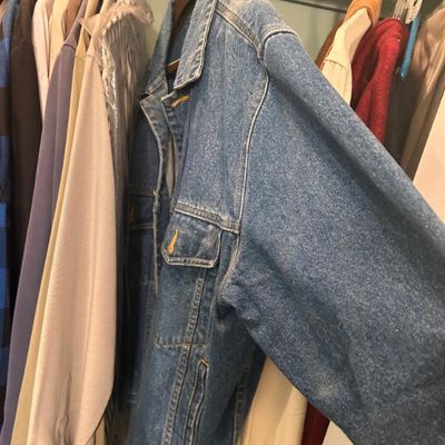 Sale Photo Thumbnail #77: Classic blue denim jacket with button-flap chest pockets and side welt pockets.