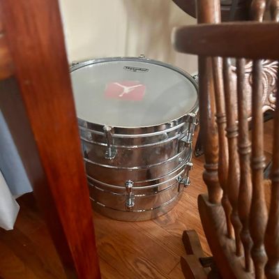 Sale Photo Thumbnail #2: Matador chrome snare drum with a white drumhead.