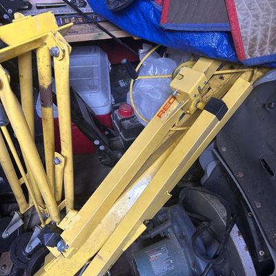 Sale Photo Thumbnail #109: Yellow Red Line drywall lift and various power tools.