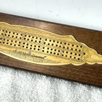 Faux scrimshaw whale cribbage board replica made by PMS Artek
