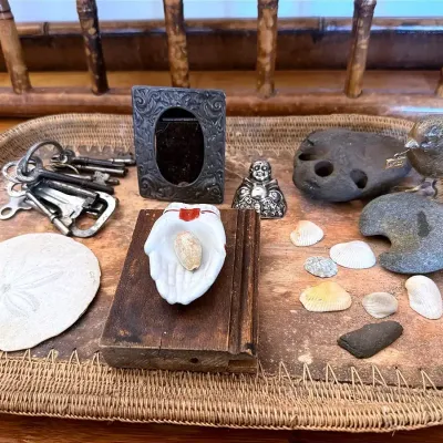Collection Of Random Found Objects On Wooden Tray