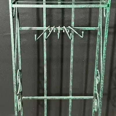 Green Scrollwork Metal Baker’s Rack With Hooks