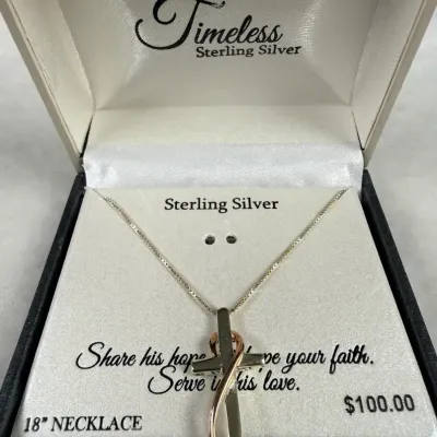 925 two-tone abstract ribbon cross necklace from the brand Timeless Sterling Silver
