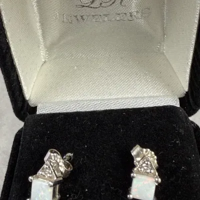  14k white gold princess-cut opal stud earrings with a unique decorative topper