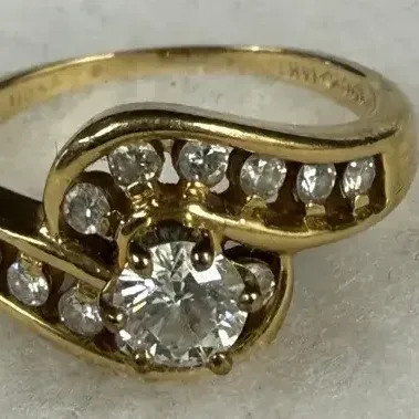 14k yellow gold bypass swirl diamond ring