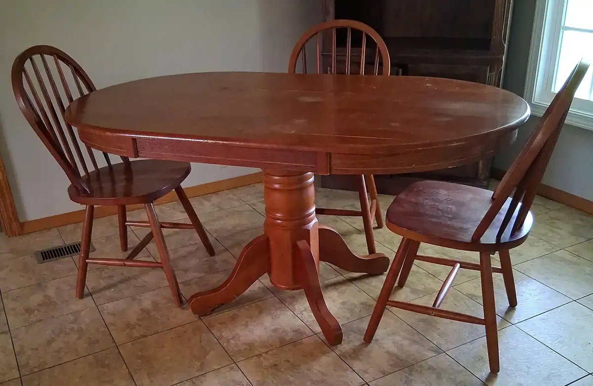 Oval Pedestal Dining Table With Three Chairs